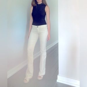 Bright Cream Sanctuary Velvet Bootcut Jeri Pants.